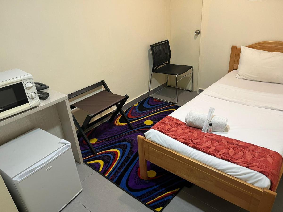 Single Sharing Room And Short Hours Stay At Sandpiper Hotel Singapur Exterior foto